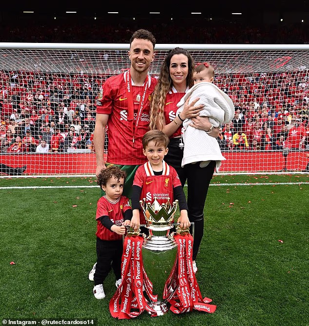105029053-15413341-Jota_is_pictured_at_Anfield_with_the_Premier_League_trophy_along-m-5_176675642966.avif