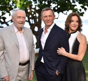 105035829-15415137-Michael_Wilson_Daniel_Craig_and_Barbara_Broccoli-m-32_1766787338778.jpg