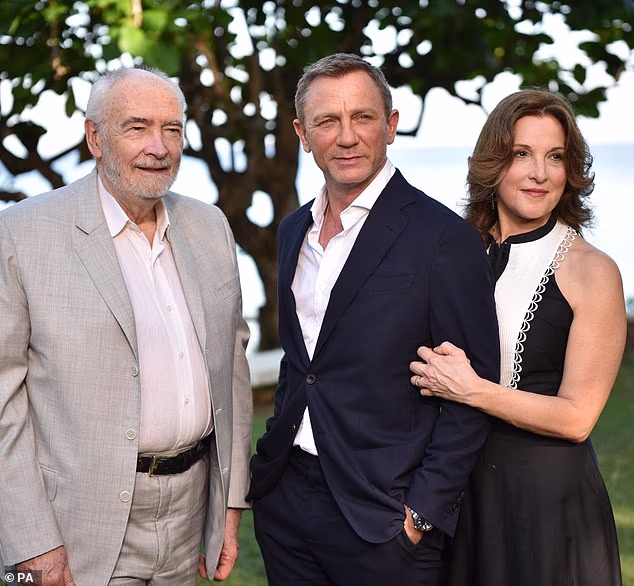 105035829-15415137-Michael_Wilson_Daniel_Craig_and_Barbara_Broccoli-m-32_1766787338778.jpg