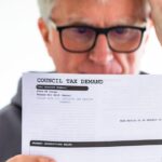 1_Worried-senior-man-checking-council-tax-bill-at-home.jpg