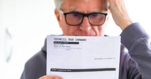 1_Worried-senior-man-checking-council-tax-bill-at-home.jpg