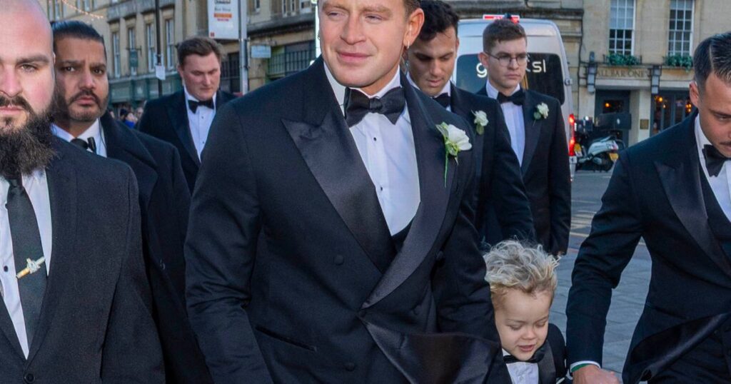 2_Adam-Peaty-arrives-to-his-wedding-followed-by-the-Beckhams-at-the-bath-abbey.jpg