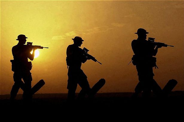 2_TOPSHOT-IRAN-BRITAIN-IRAQ-ROYAL-MARINES.jpg