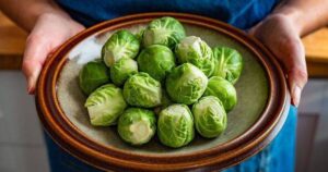 3_Woman-holding-bowl-with-raw-brussels-sprouts.jpg
