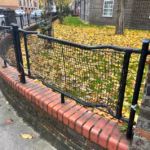 92079365-15327597-Fences_on_Watts_Grove_Estate_just_off_Devons_Road_in_Tower_Hamle-a-56_176598294476.avif