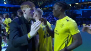 LB-OP-ginge-handshake.jpg