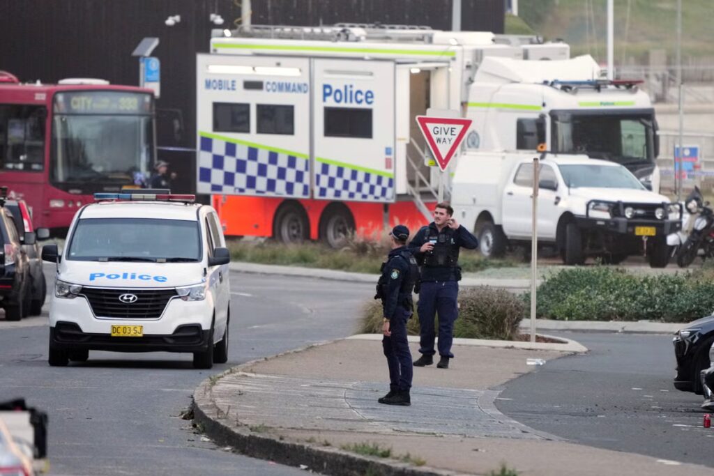 Police-patrol-in-the-early-morning-following-a-shooting-Sunday-at-Sydneys-Bondi-Beach-Monday.jpeg