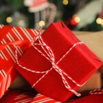 christmas-presents-background-red-gold-777308548.jpg