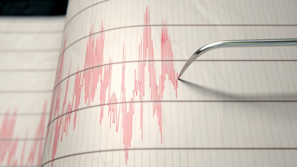 closeup-seismograph-machine-needle-drawing-1048274691.jpg