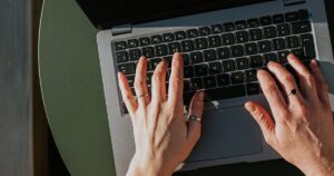 0_Close-up-of-hands-typing-on-a-laptop-computer.jpg