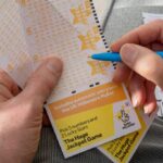 0_Close-up-of-man-filling-in-EuroMillions-Lotto-lottery-form.jpg