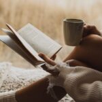 0_Close-up-picture-of-book-and-coffee-cup-in-woman-hands-Autumn-mood-cosiness-and-comfort-concept.jp_.jpeg