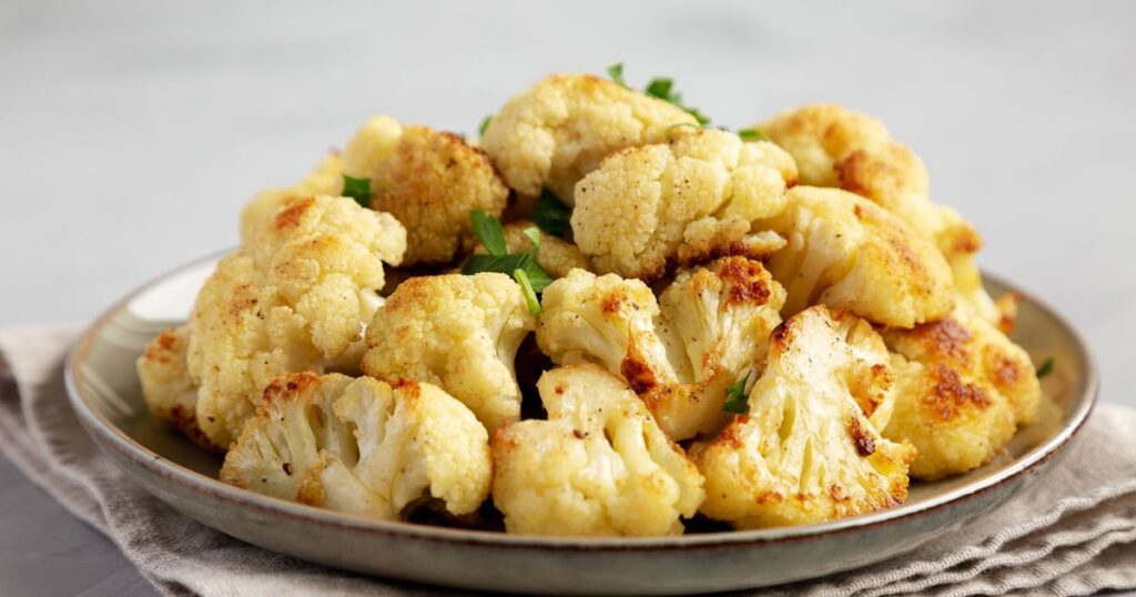 0_Cooked-White-Cauliflower-on-a-Plate-side-view.jpg