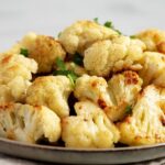0_Cooked-White-Cauliflower-on-a-Plate-side-view.jpg