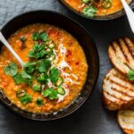 0_Curried-red-lentil-tomato-and-coconut-soup-delicious-vegetarian-food-on-grey-background-top-view-F.jpeg