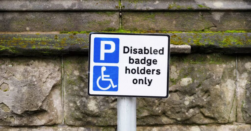0_Disabled-blue-badge-holder-parking-sign-for-driver.jpg