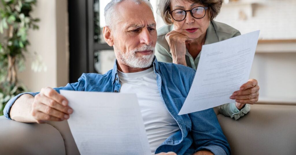 0_Senior-grandparents-reading-documents-having-issue-problem-debt-with-money-loss.jpg