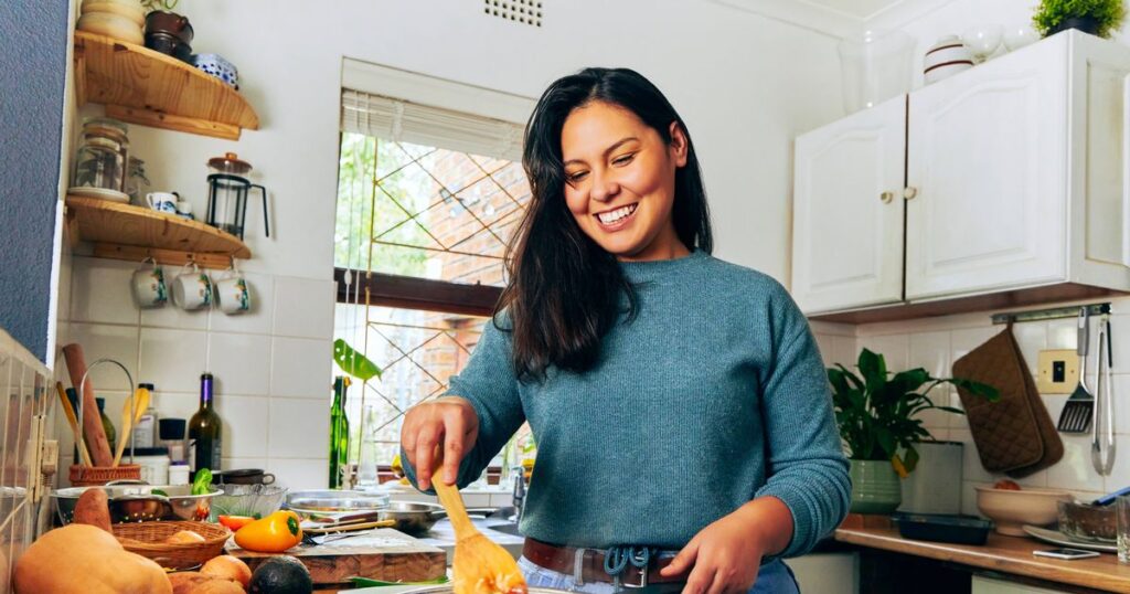 0_Shot-of-a-young-woman-stirring-vegetables-on-the-stove.jpg