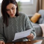 0_Woman-checking-her-monthly-expenses-and-statements-at-home.jpg