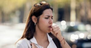 0_Young-woman-coughing-at-street.jpg