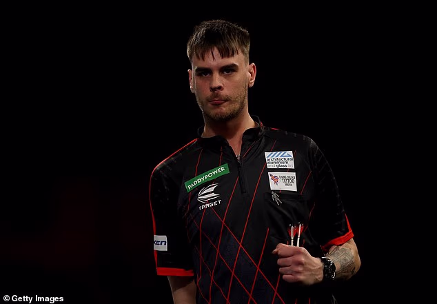 104921461-15464629-Darts_star_Dom_Taylor_has_apologised_after_he_was_kicked_out_of_-a-1_176842232248.avif