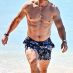 105160637-15427383-Mark_Wahlberg_and_Rhea_Durham_flaunted_their_swimsuit_bodies_as_-m-40_17672900612.avif