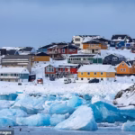 105387291-15477475-Colorful_houses_line_the_snowy_coast_of_Nuuk_the_capital_city_of-a-4_176883548631.avif