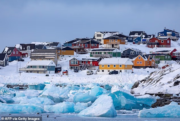 105387291-15477475-Colorful_houses_line_the_snowy_coast_of_Nuuk_the_capital_city_of-a-4_176883548631.avif