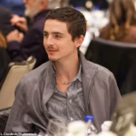 105393247-15450935-Timothee_Chalamet_30_flashed_a_pricy_piece_of_jewelry_as_he_atte-a-123_1768013178.avif