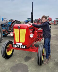105598563-15473305-Alex_cleans_the_newly_restored_tractor-m-29_1768674692216.jpg