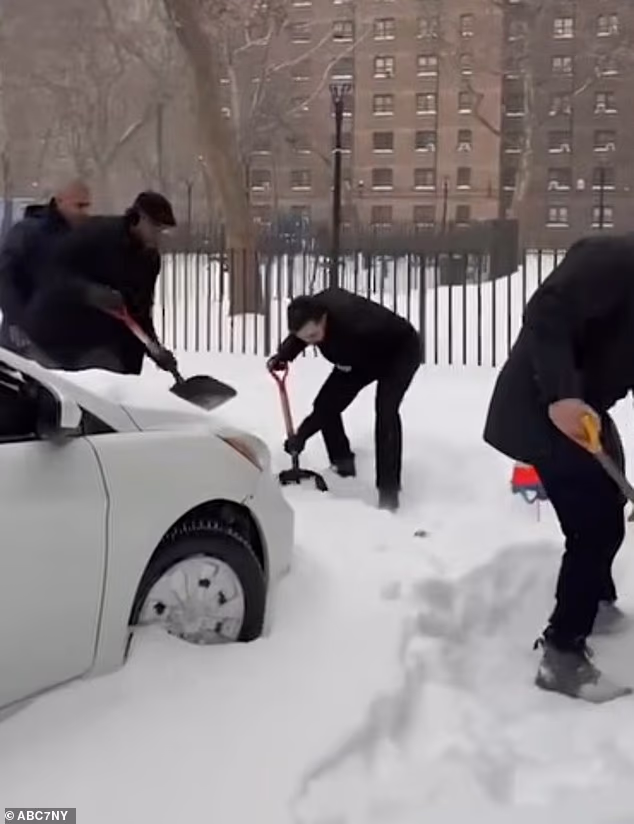 105844989-15499633-New_York_City_Mayor_Zohran_Mamdani_helped_shovel_snow_in_Brookly-a-54_17694633442.avif