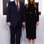 105951421-15511923-The_First_Lady_donned_a_buttoned_black_dress_and_stilettos_as_sh-m-2_176975359313.avif