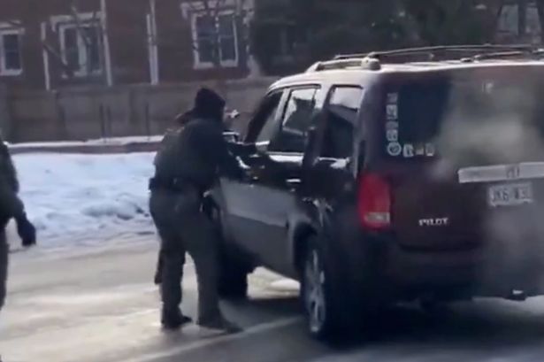 1_EXPRESS-New-video-emerges-of-moment-ICE-officer-shoots-woman-in-face-on-Minneapolis-street.jpg