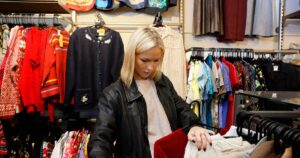 3_A-young-women-shopping-in-a-vintage-charity-clothes-shop.jpg