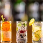 3_Five-gin-tonic-cocktails-in-wine-glasses-on-bar-counter-in-pup-or-restaurant.jpg