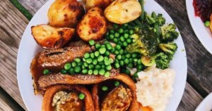 3_Traditional-British-Sunday-roast-dinner-with-chicken-vegetables-gravy-and-a-Yorkshire-pudding.jpg