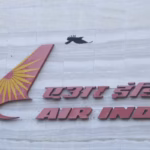 FILE-PHOTO-A-bird-flies-over-a-logo-of-Air-India-airlines-at-the-corporate-headquarters-in-Mumbai-mq.avif