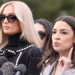 Rep-Alexandria-Ocasio-Cortez-D-NY-right-speaks-as-Paris-Hilton-left-listens-during-a-news-conferenc.avif