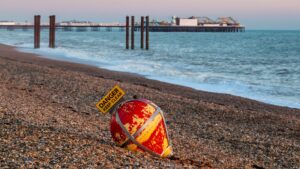 buoy-washed-beach-brighton-1049022375.jpg