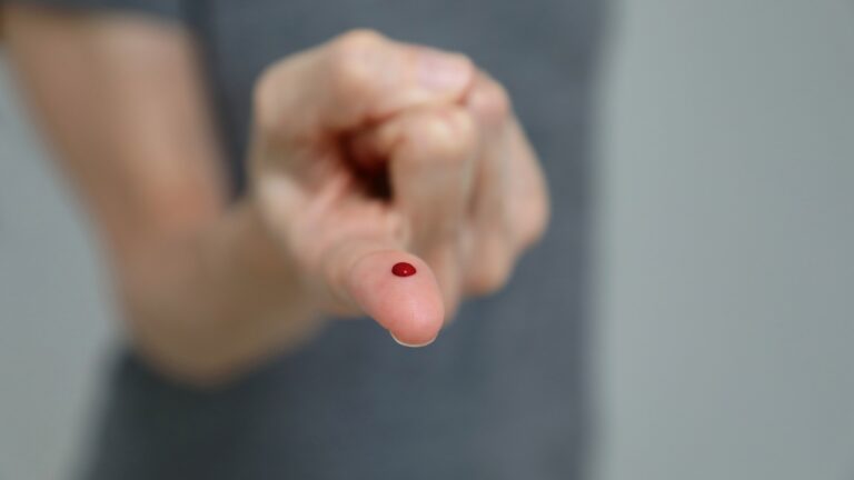 close-finger-pricked-blood-test-657892803.jpg