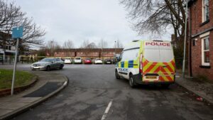cordon-off-manchester-road-rhodes-1048861051.jpg