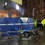 police-cordon-remains-place-morning-1051863588.jpg