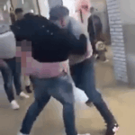 punch-moment-two-thugs-brawl-1048746447.webp.png