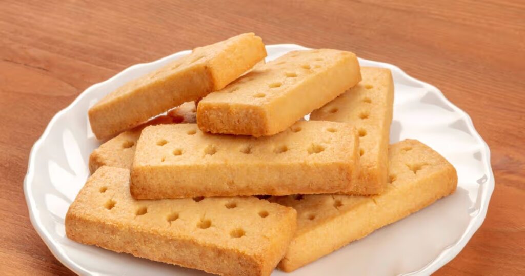 0_A-closeup-photo-of-Scottish-shortbread-butter-cookies-on-a-rustic-wooden-background.jpg