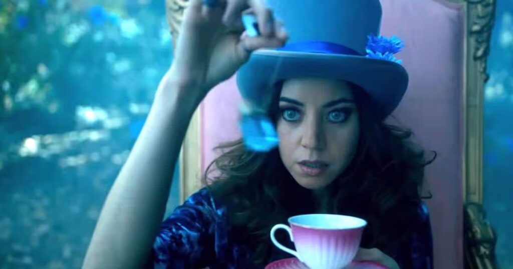 0_A-woman-in-a-purple-top-hat-holds-a-teacup-and-saucer.jpg