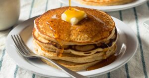 0_Close-up-of-pancakes-in-plate-on-tableUnited-StatesUSA.jpg