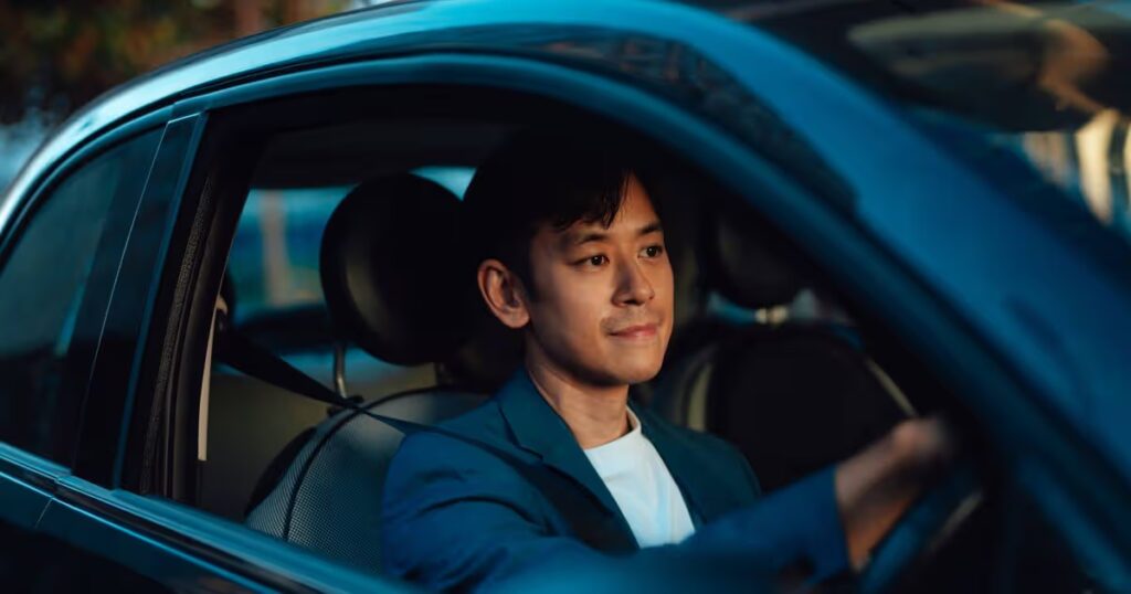 0_Confident-Asian-male-entrepreneur-enjoying-driving.jpg