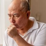 0_Elderly-man-suffering-symptoms-of-cold-and-flu.jpg