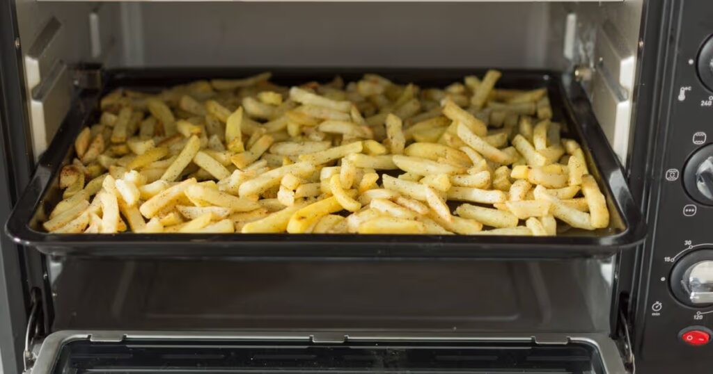 0_Oven-baked-potato-sticks-French-fries-inside-an-oven.jpg