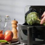 0_Placing-Fresh-Broccoli-into-Air-Fryer.jpg